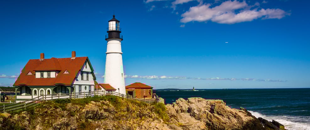 Portland Head Lighthouse and the Atlantic Ocean at Fort Williams Park in Cape Elizabeth, Maine.cropped